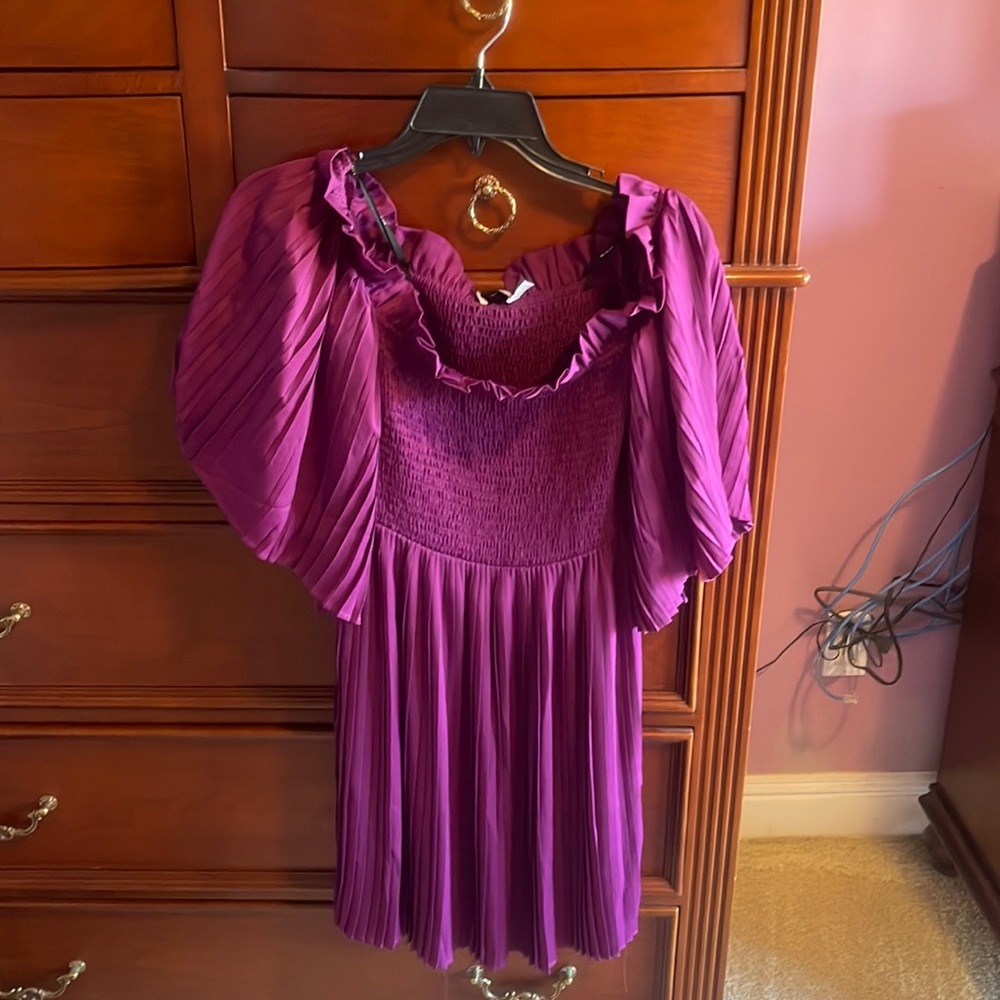 Size medium , Color purple , brand:Ali and jay